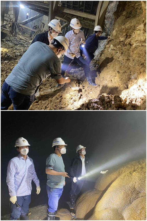 技术质量部副总工米德才、李洋溢在勤兰隧道勘察岩溶情况.jpg